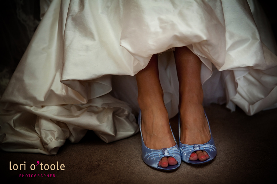 white wedding dress with blue shoes